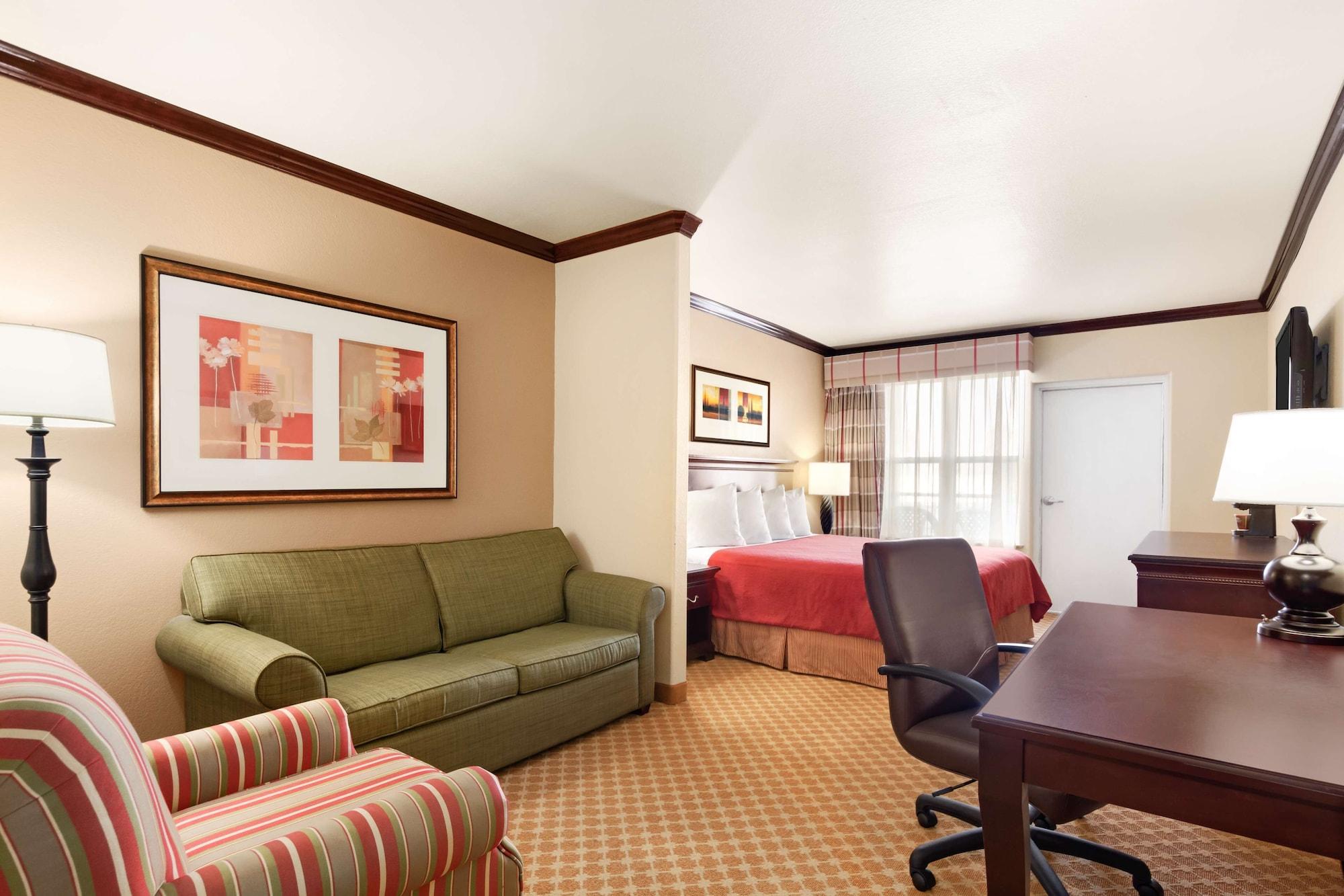 Country & By Radisson, Beach, Tx